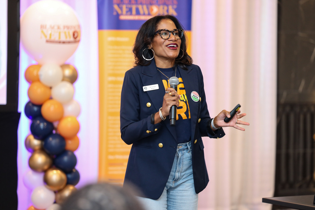 Dr. Amanda L. Aiken speaking at a keynote event